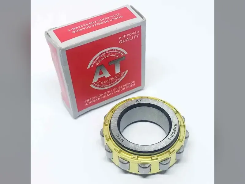 A cylindrical roller bearing beside its box